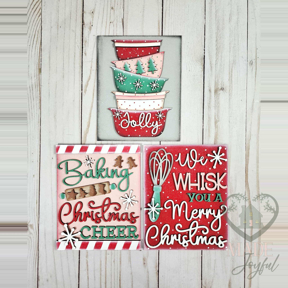Christmas Baking insert trio of hand-painted 3D wood signs: stacked vintage Jolly mixing bowls, Baking Christmas Cheer with a rolling pin, and We Whisk You a Merry Christmas, made in Brentwood, TN.