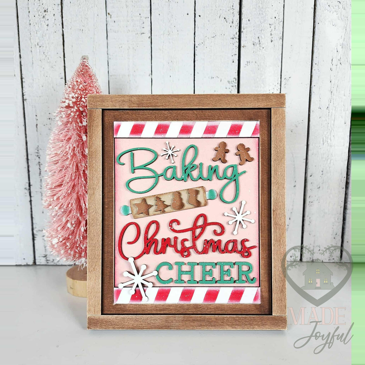 Baking Christmas Cheer 3D wood insert with mint and red script, rolling pin, gingerbread cookies, and candy-stripe border in a stained farmhouse frame.