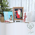 Oh Deer Christmas insert trio: a Be Merry Santa in a stained wood frame with a Believe reindeer and birch-tree sign and a Reindeer name-list sign on stands, hand-painted in Brentwood, TN.