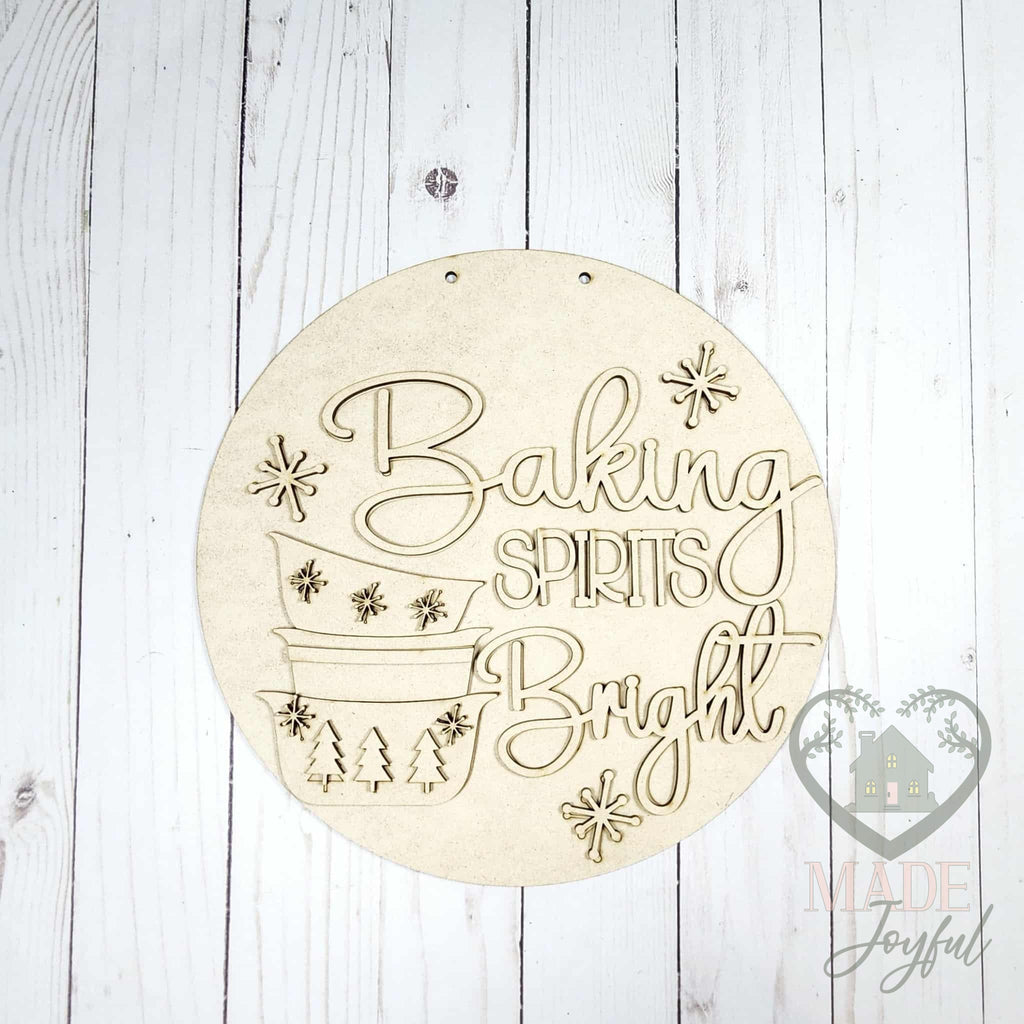 Unfinished laser-cut wood Baking Spirits Bright door hanger kit, ready to paint at a DIY party in Williamson County, TN.