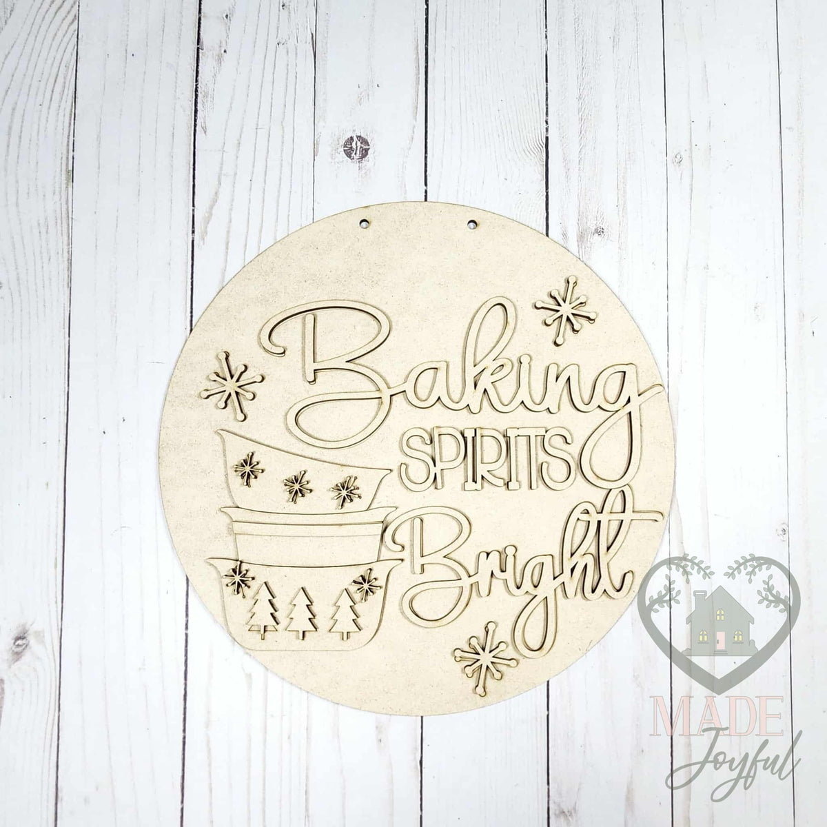 Unfinished laser-cut wood Baking Spirits Bright door hanger kit, ready to paint at a DIY party in Williamson County, TN.