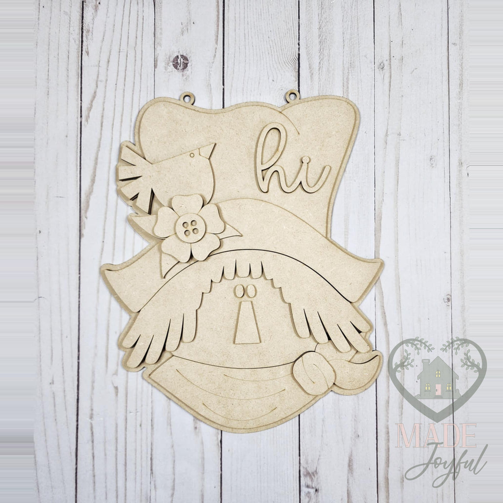 Unfinished laser-cut wood Hi Scarecrow door hanger kit, ready to paint at a DIY party in Williamson County, TN.