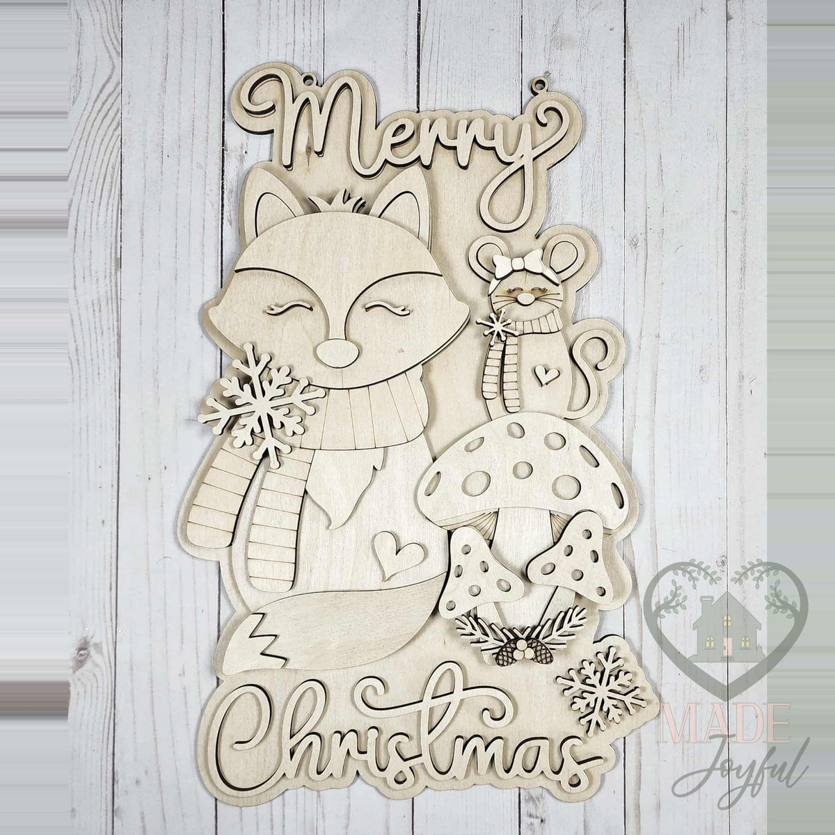 Unfinished laser-cut wood Forest Friends Merry Christmas door hanger kit, ready to paint at a DIY party in Williamson County, TN.