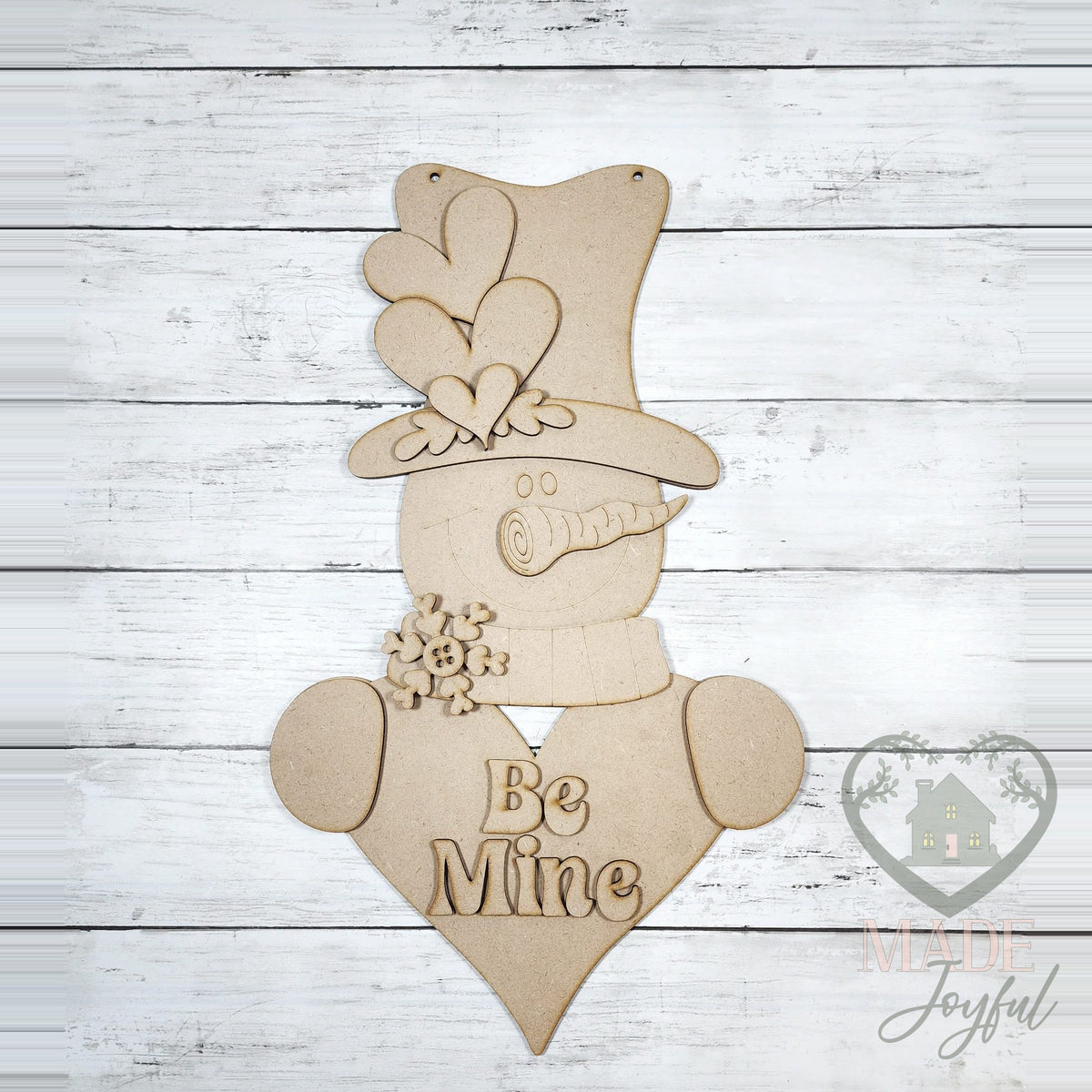 Unfinished laser-cut wood Be Mine Valentine snowman door hanger kit, ready to paint at a DIY party in Williamson County, TN.