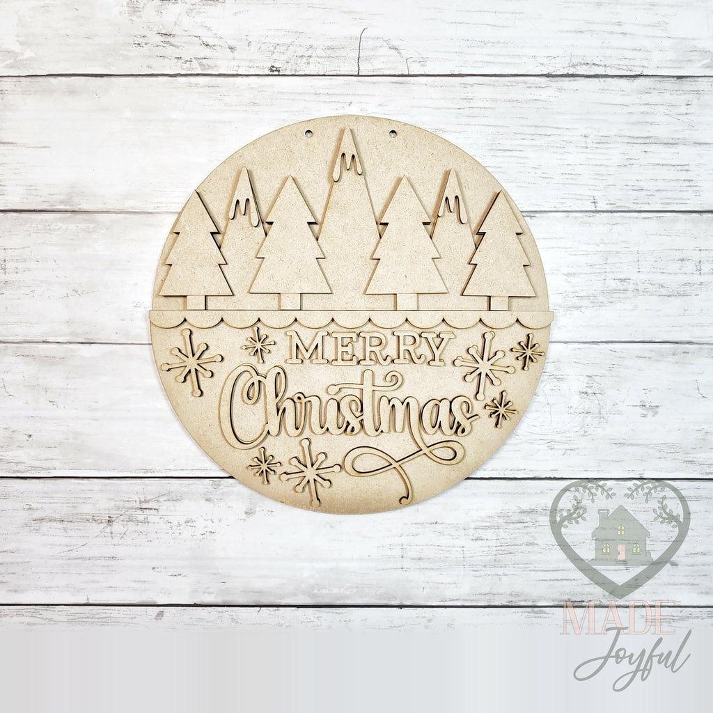 Unfinished laser-cut wood Merry Christmas Trees door hanger kit, ready to paint at a DIY party in Williamson County, TN.