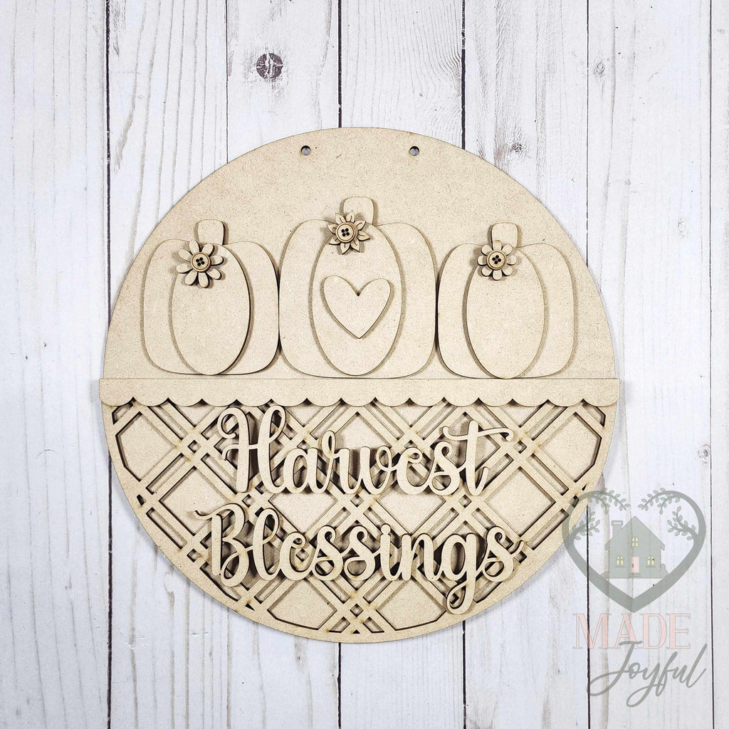 Unfinished laser-cut wood Harvest Blessings door hanger DIY kit, ready to paint at a DIY party in Williamson County, TN.