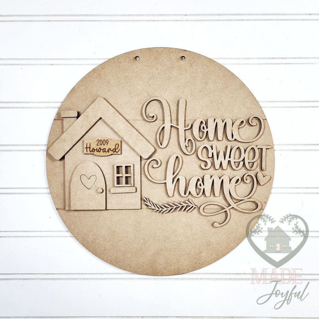 Unfinished laser-cut wood Home Sweet Home door hanger kit, ready to paint at a DIY party in Williamson County, TN.