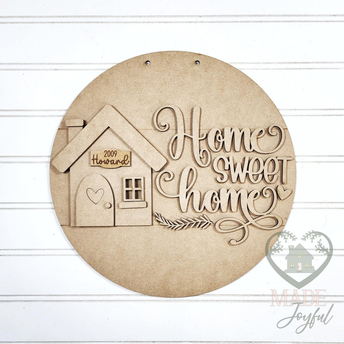 Unfinished laser-cut wood Home Sweet Home door hanger kit, ready to paint at a DIY party in Williamson County, TN.
