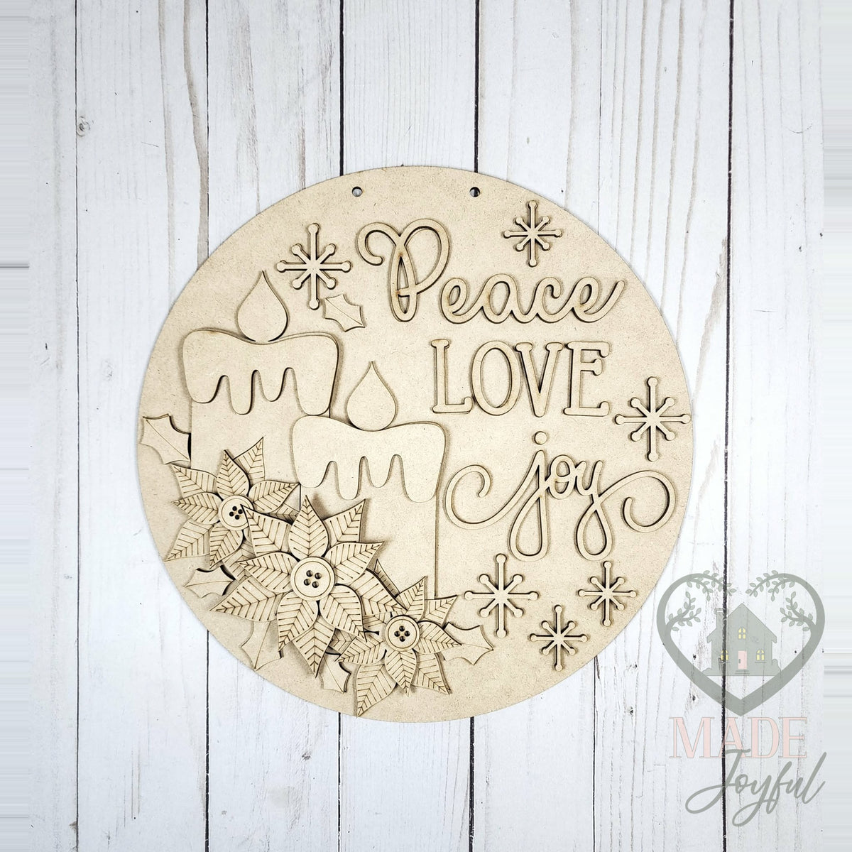 Unfinished laser-cut wood Peace Love Joy poinsettia door hanger kit, ready to paint at a DIY party in Williamson County, TN.