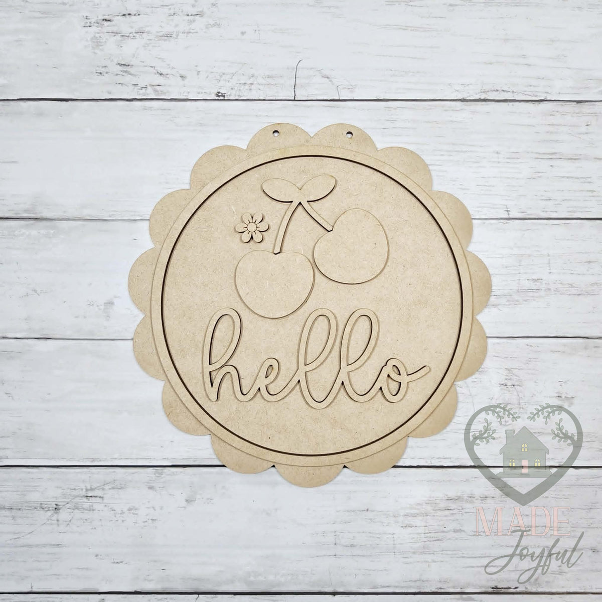 Unfinished laser-cut wood Hello Cherry scalloped door hanger kit, ready to paint at a DIY party in Williamson County, TN.