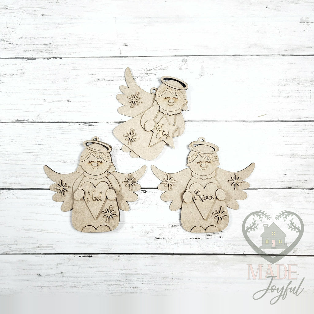 Unfinished laser-cut wood angel ornament kit with three angels, ready to paint at a DIY party in Williamson County, TN.