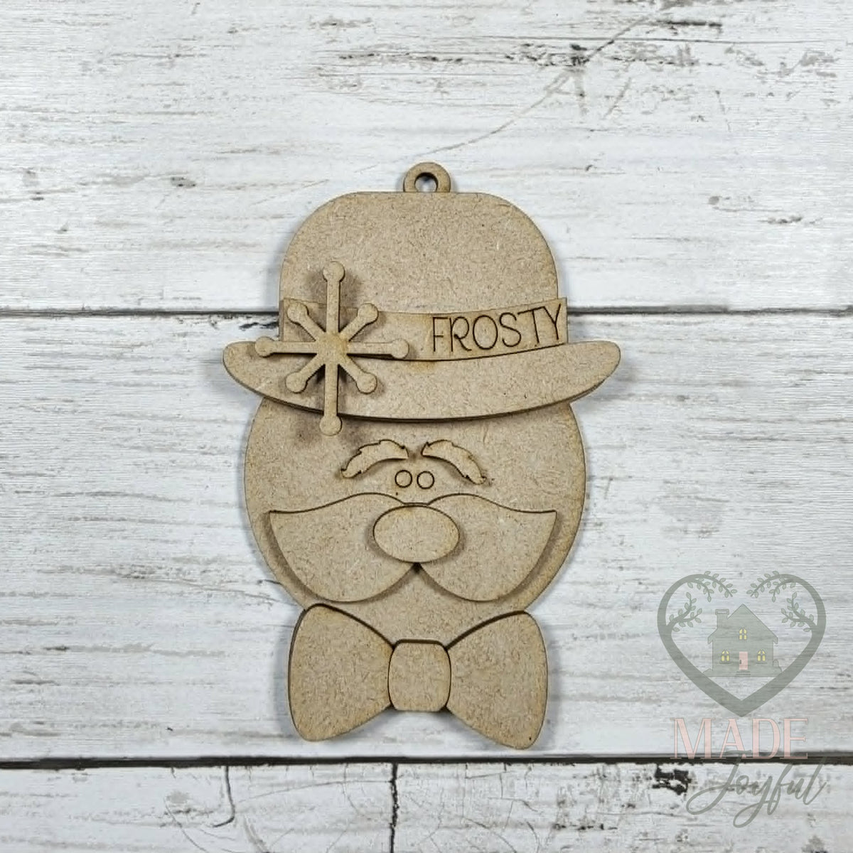 Unfinished laser-cut wood Sir Winston snowman ornament kit, ready to paint at a DIY party in Williamson County, TN.
