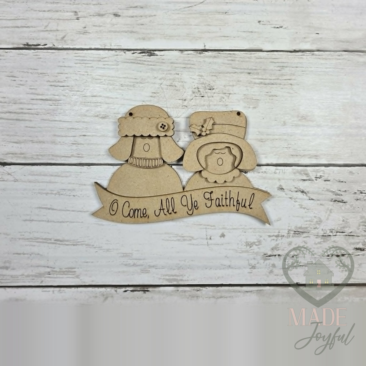 Unfinished laser-cut wood Christmas caroler ornament kit, ready to paint at a DIY party in Williamson County, TN.