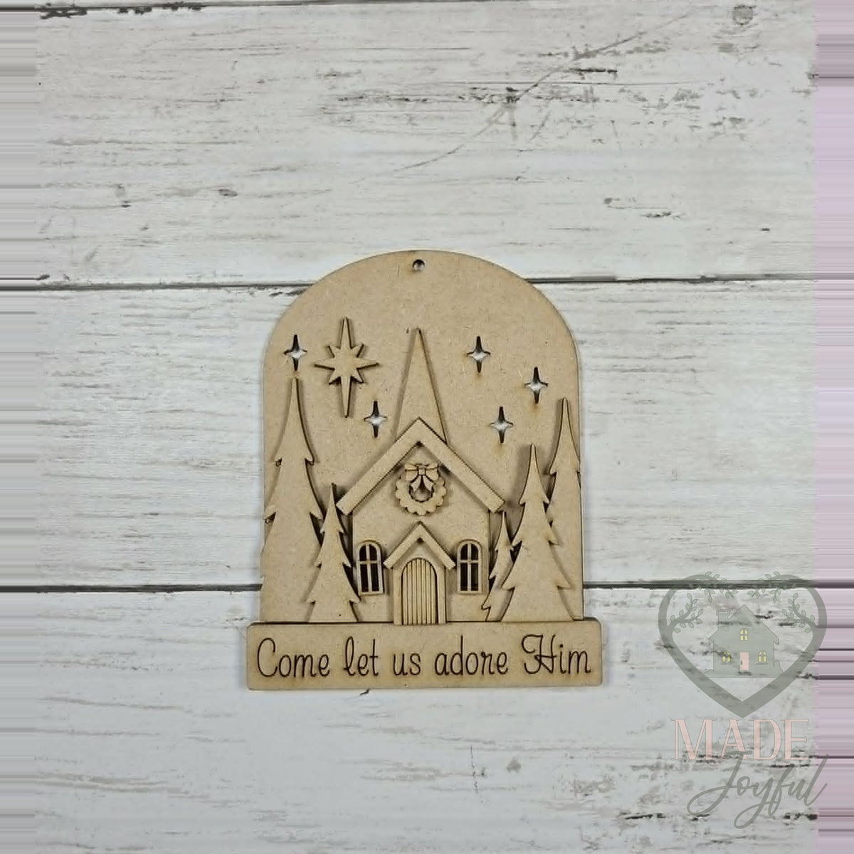 Unfinished laser-cut wood Christmas church ornament kit, ready to paint at a DIY party in Williamson County, TN.