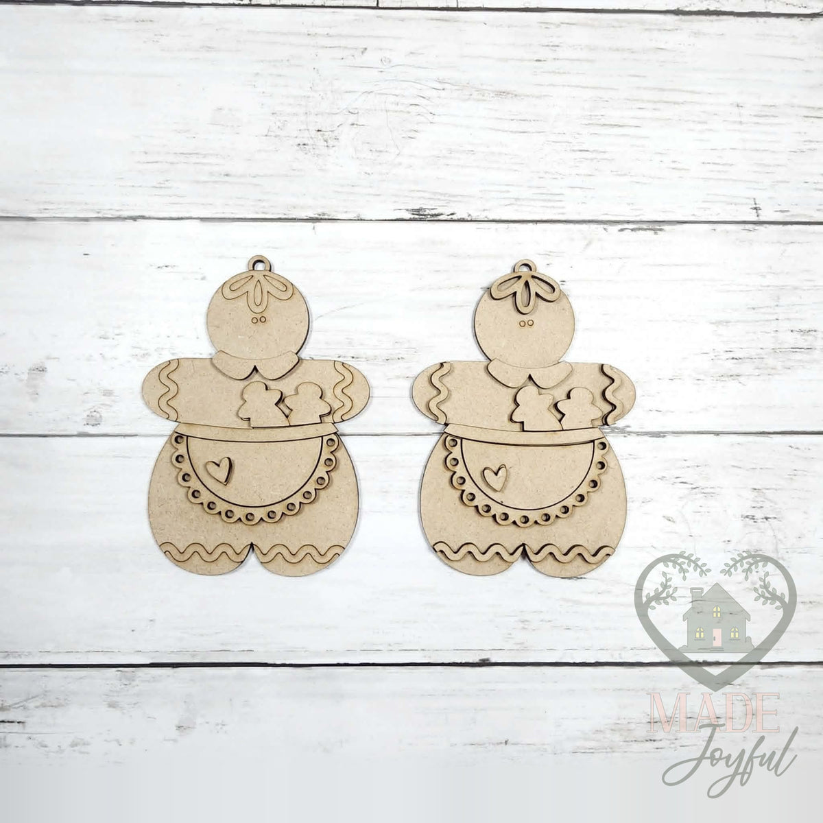 Unfinished laser-cut wood gingerbread baker ornament kit with two ornaments, ready to paint at a DIY party in Williamson County, TN.