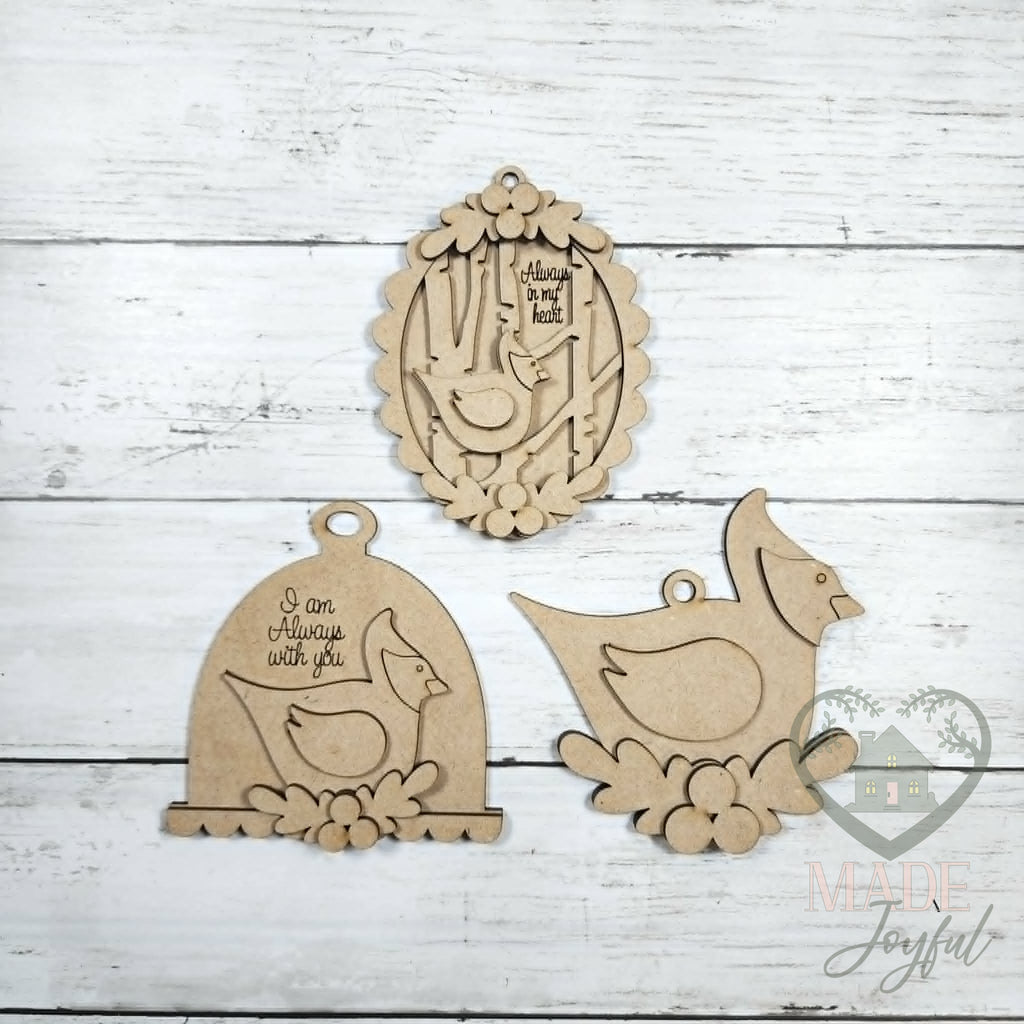 Unfinished laser-cut wood cardinal ornament kit with three ornaments, ready to paint at a DIY party in Williamson County, TN.