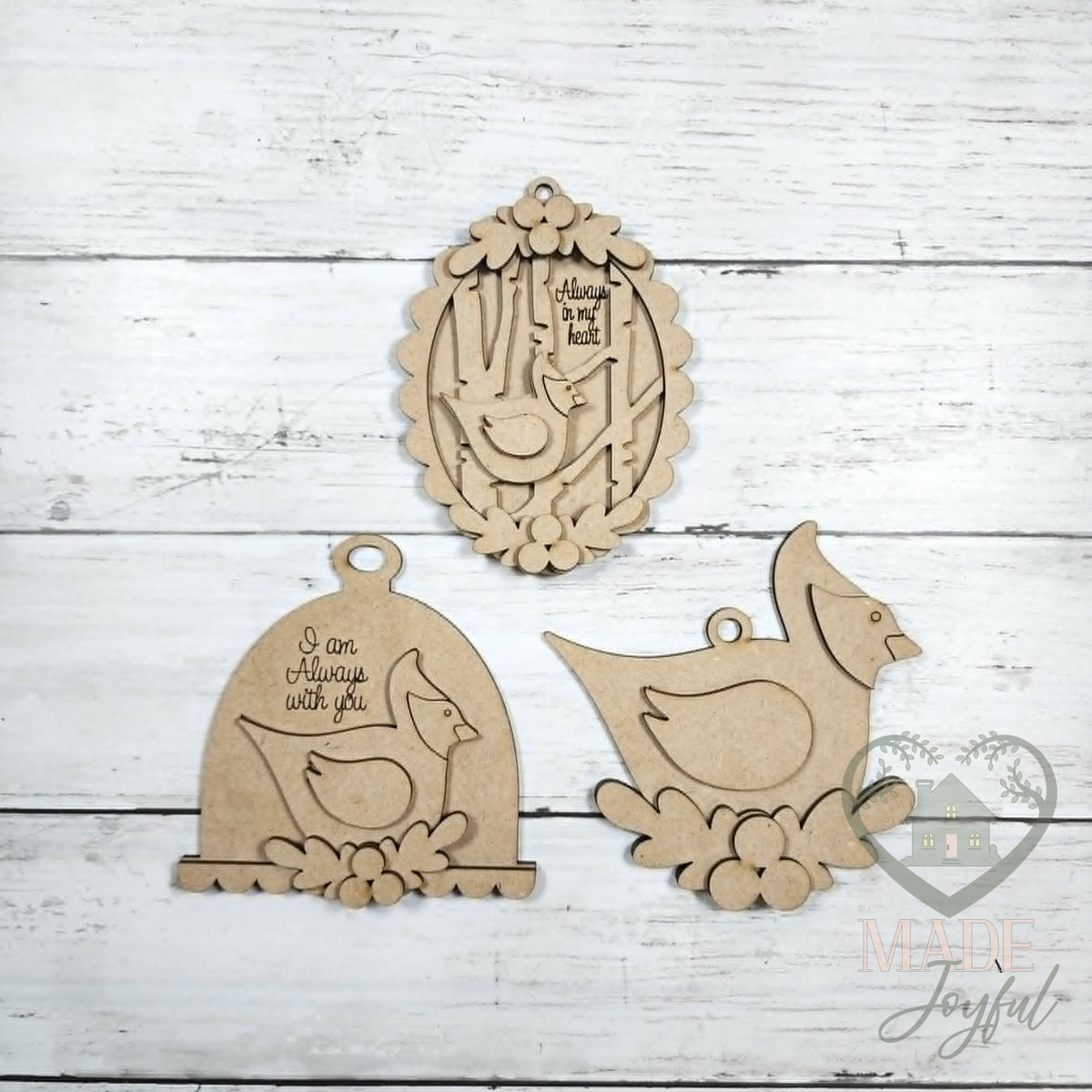 Unfinished laser-cut wood cardinal ornament kit with three ornaments, ready to paint at a DIY party in Williamson County, TN.
