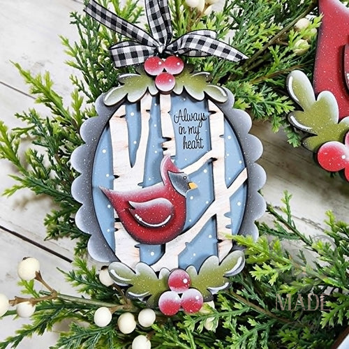 Cardinal frame ornament with birch trees and Always In My Heart script on blue, with holly and a gingham bow, hand-painted in Brentwood, TN.