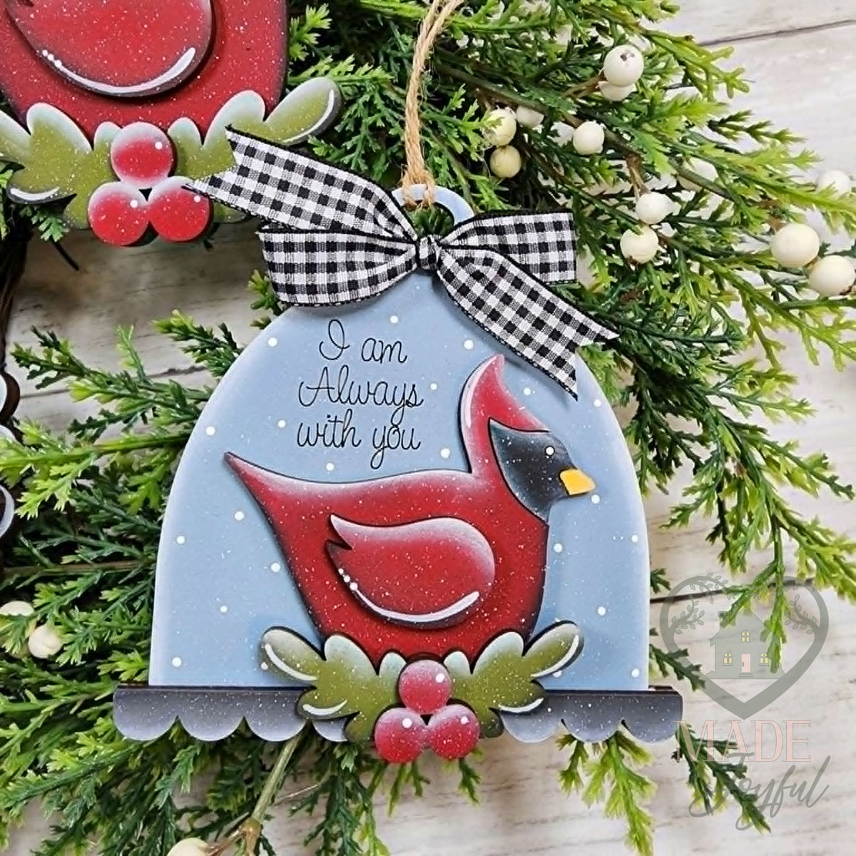 Cardinal cloche ornament reading I Am Always With You, with a red cardinal, holly berries and a gingham bow, hand-painted in Brentwood, TN.