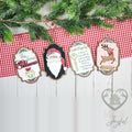 North Pole ornament set with This House Believes, Santa, Santa's Magic Key and a personalized reindeer ornament, hand-painted in Brentwood, TN.