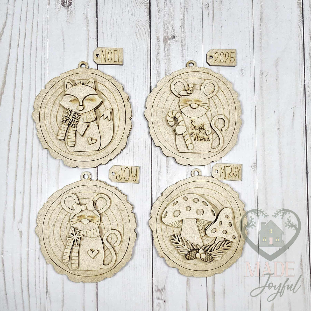 Unfinished laser-cut wood forest friends ornament kit with four ornaments, ready to paint at a DIY party in Williamson County, TN.