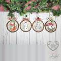 Four forest friends ornaments on wood-slice rounds with a fox, white mouse, gray mouse and red mushroom, hung with gingham bows, hand-painted in Brentwood, TN.