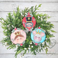 Nutcracker ballet ornament set with the Nutcracker, Clara and the Mouse King on round frames with pink roses, hand-painted in Brentwood, TN.