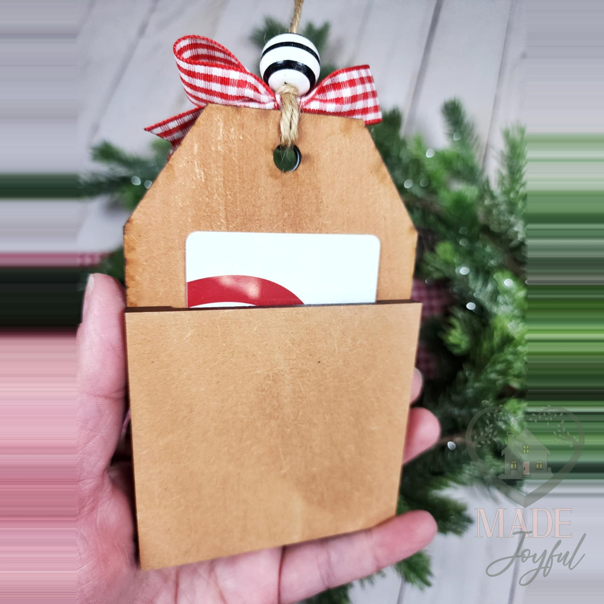 Polar bear tag ornament used as a gift card holder with a back pocket
