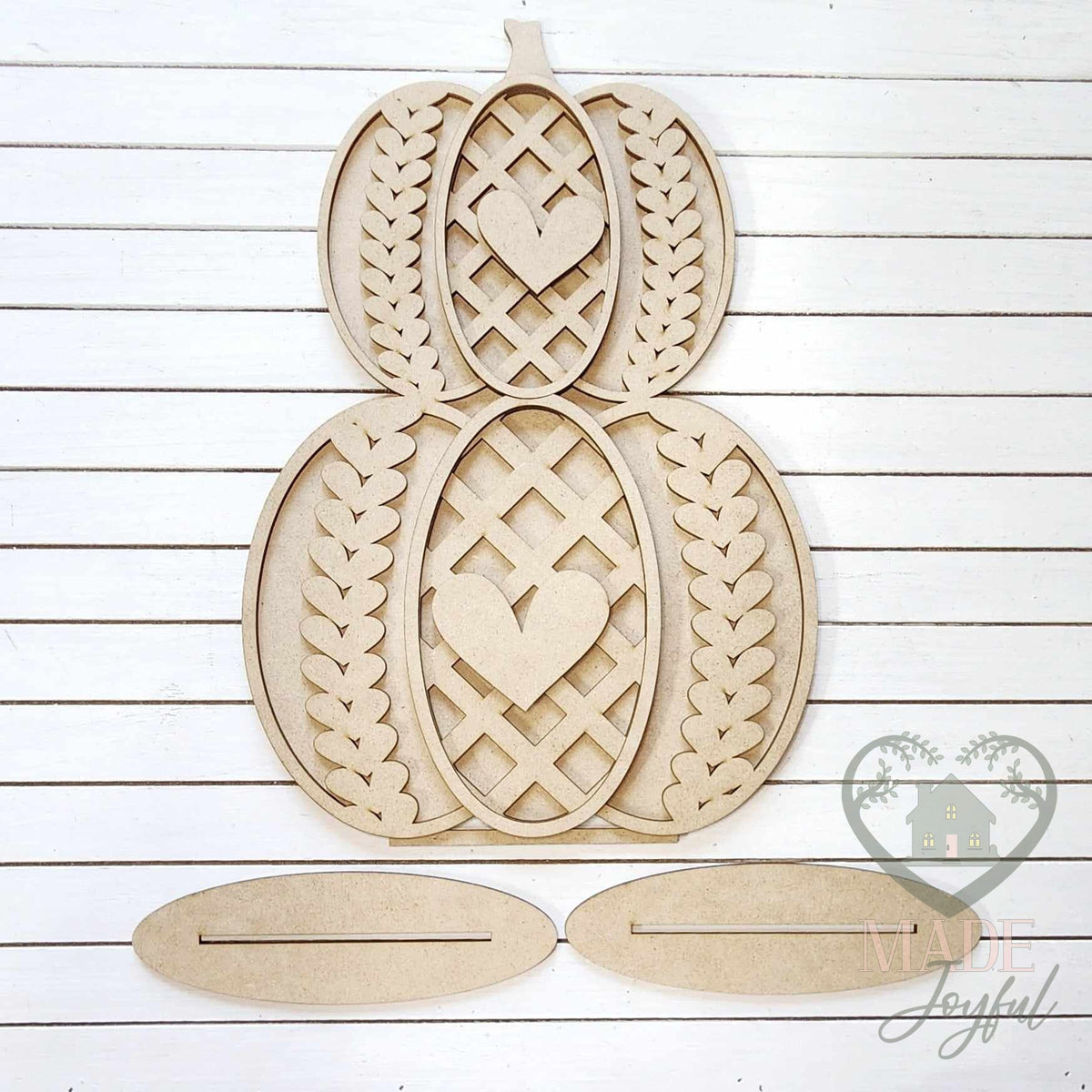 Unfinished laser-cut wood Sweater Weather Pumpkin Shelf Sitters DIY kit (stacked pieces), ready to paint at a DIY party in Williamson County, TN.