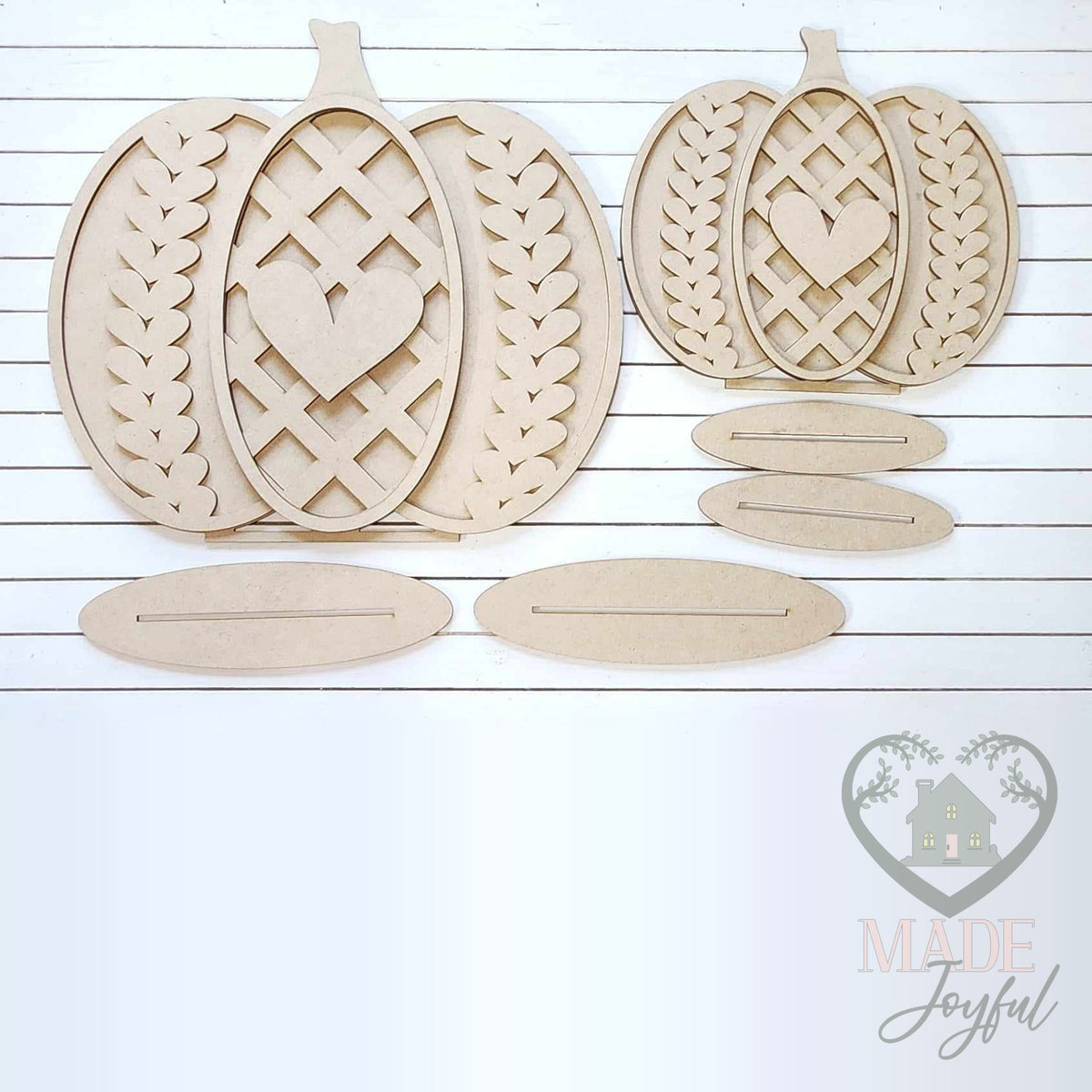 Unfinished laser-cut wood Sweater Weather Pumpkin Shelf Sitters DIY kit (large and small pieces), ready to paint at a DIY party in Williamson County, TN.