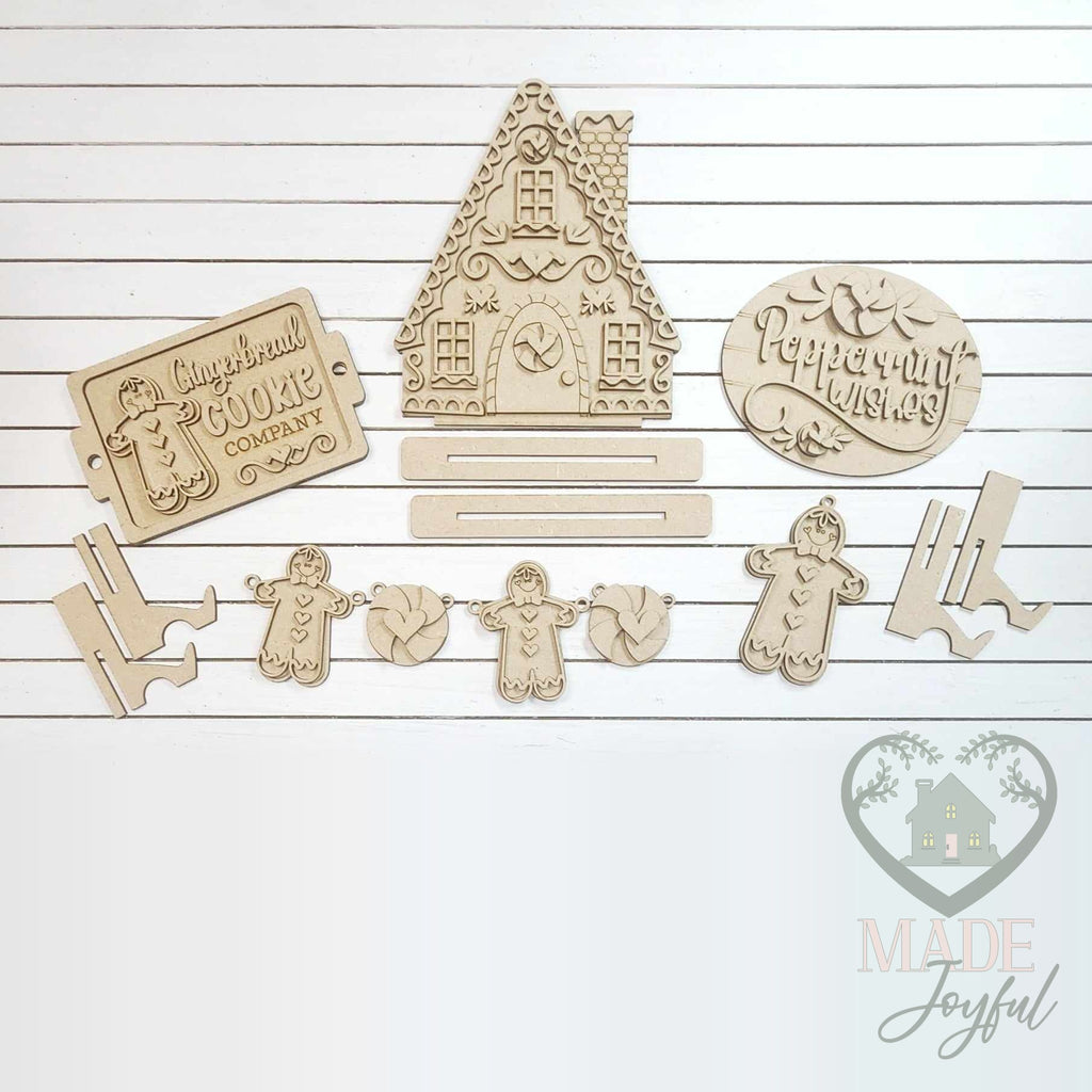 Unfinished laser-cut wood Gingerbread Cookie Company Tiered Tray Decor Set DIY kit, ready to paint at a DIY party in Williamson County, TN.