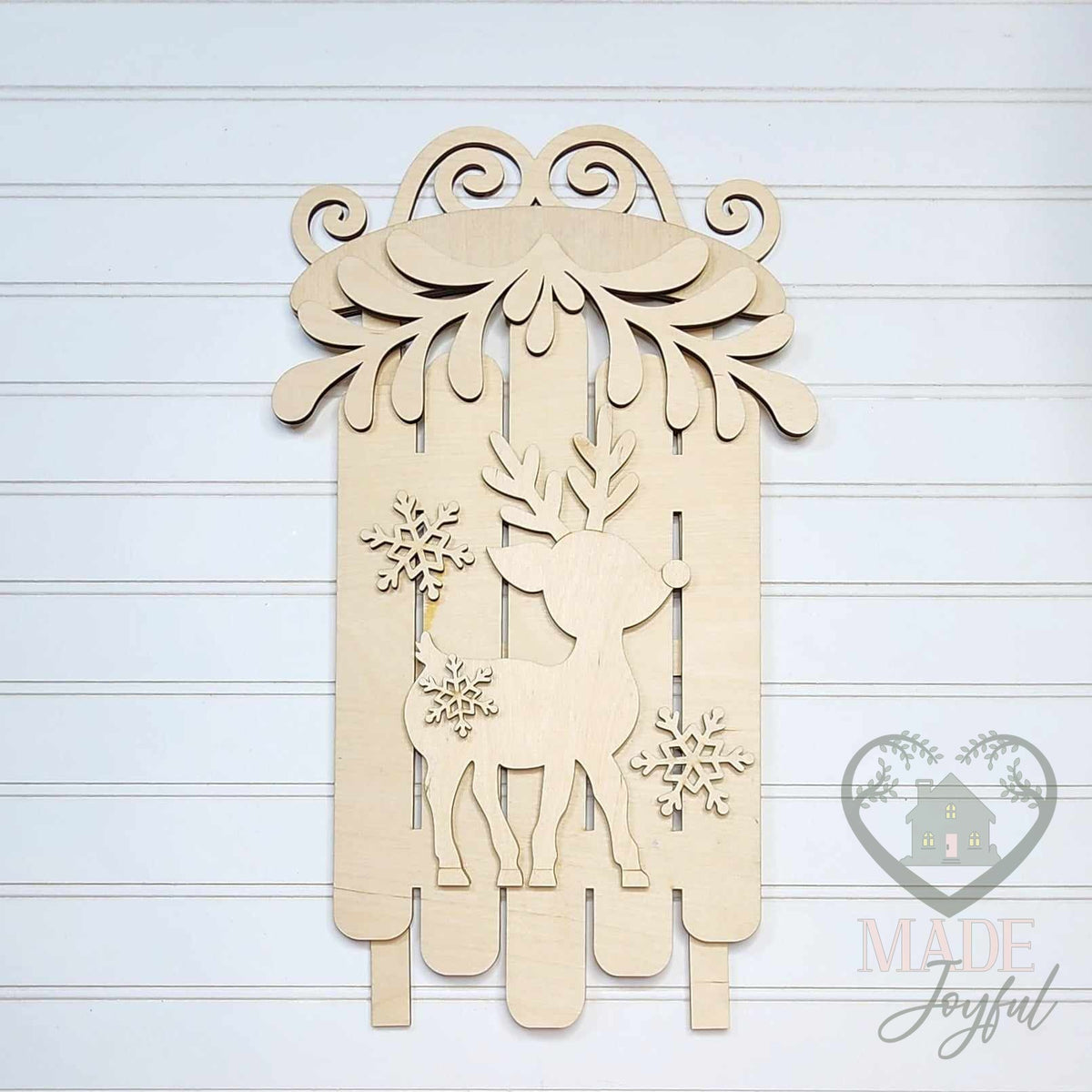 Unfinished laser-cut wood Oh Deer Christmas Sled DIY kit, ready to paint at a DIY party in Williamson County, TN.