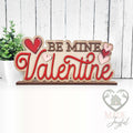 Be Mine Valentine word art shelf sitter in red and pink with hearts, hand-painted in Brentwood, TN.