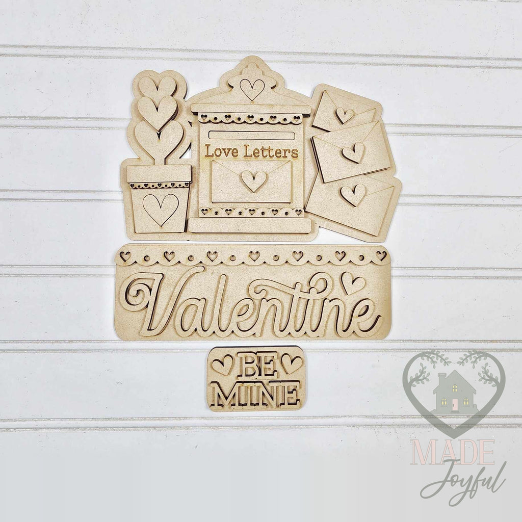 Unfinished laser-cut wood Love Letters Valentine Truck & Basket Insert DIY kit, ready to paint at a DIY party in Williamson County, TN.