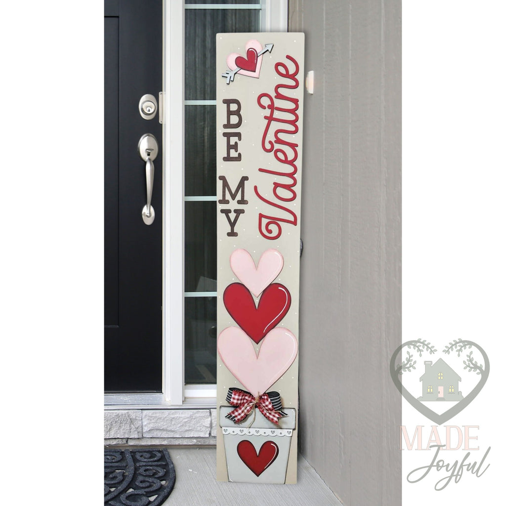 Be My Valentine porch leaner with heart topiary on a front porch, hand-painted in Brentwood, TN.
