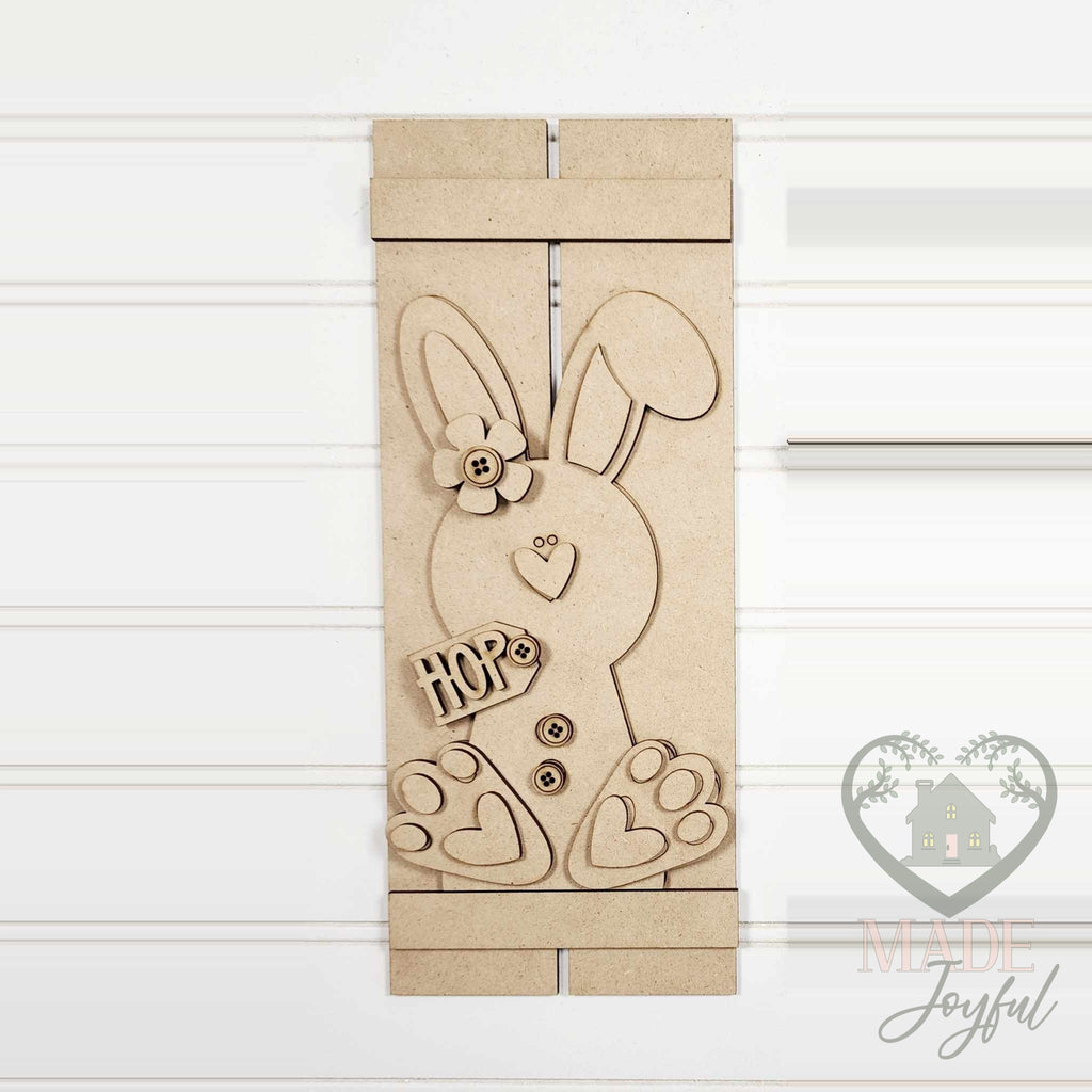 Unfinished laser-cut wood Prim Bunny Table Top Pallet DIY kit, ready to paint at a DIY party in Williamson County, TN.