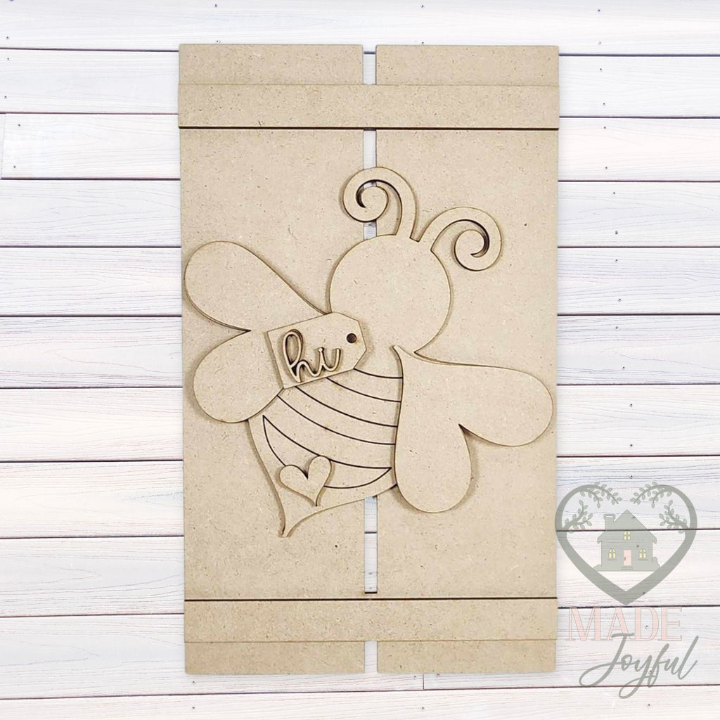 Unfinished laser-cut wood Honey Bee Pallet Leaner DIY kit, ready to paint at a DIY party in Williamson County, TN.