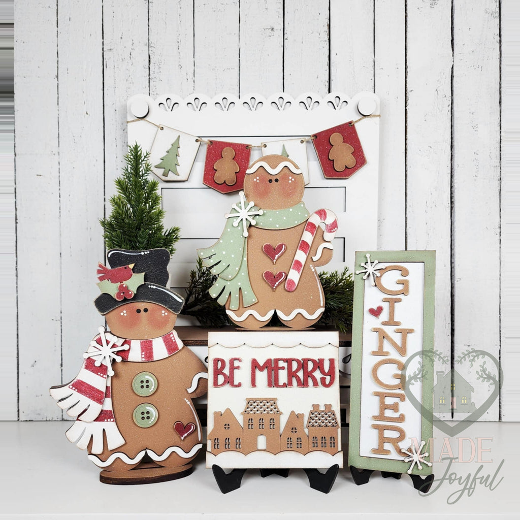 Victorian gingerbread tiered tray set with gingerbread boy, snowman cookie, Be Merry sign, and Ginger sign, hand-painted in Brentwood, TN.