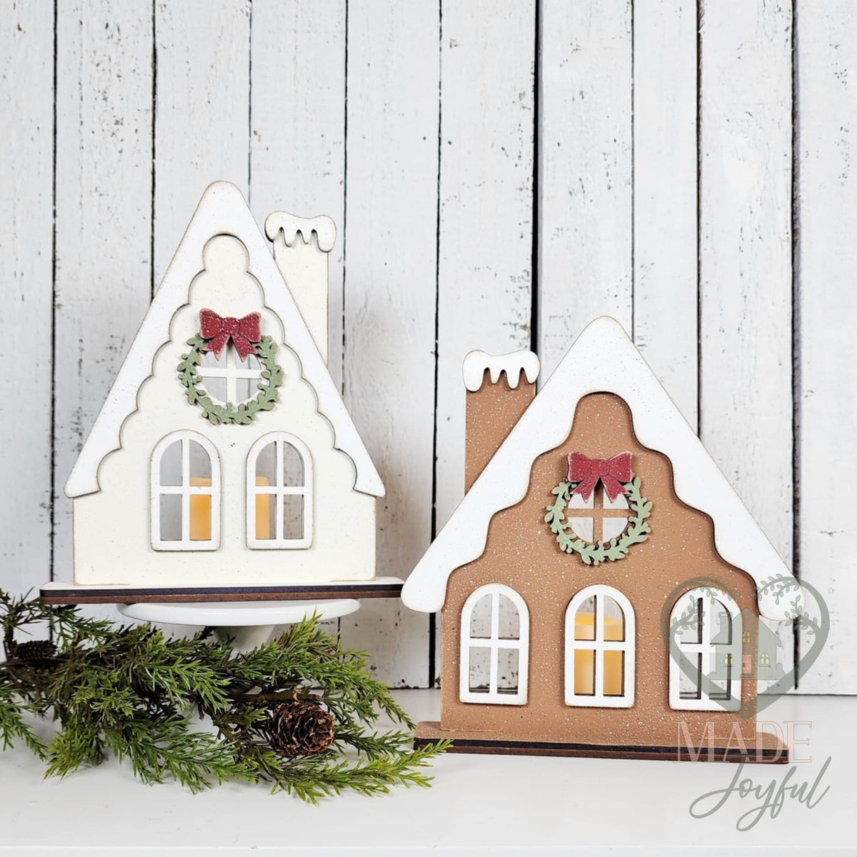 Pair of gingerbread house votive holders in white and brown with wreaths, hand-painted in Brentwood, TN.
