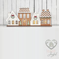 Gingerbread village shelf sitter with four frosted houses, hand-painted in Brentwood, TN.