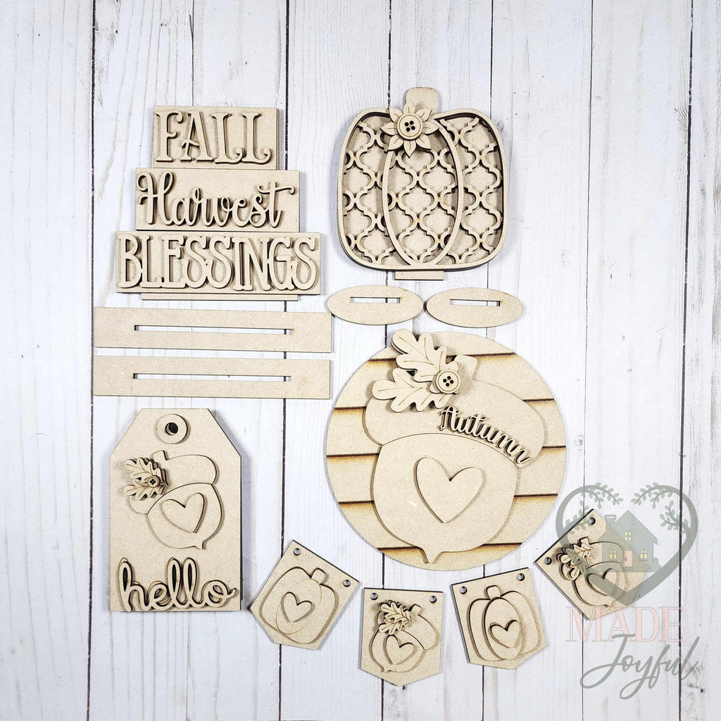 Unfinished laser-cut wood Fall Harvest Tiered Tray Decor Set DIY kit, ready to paint at a DIY party in Williamson County, TN.