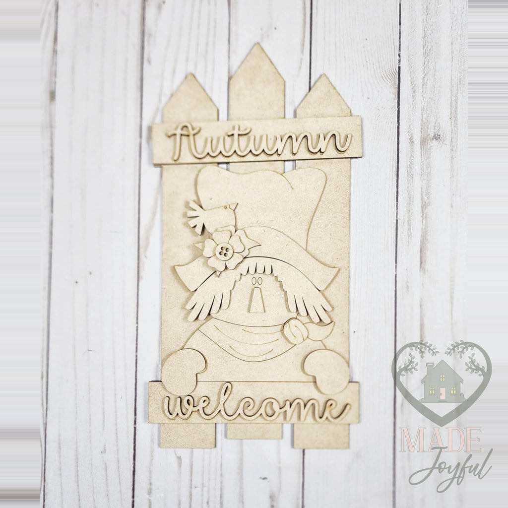 Unfinished laser-cut wood Autumn Welcome Scarecrow Fence Leaner DIY kit, ready to paint at a DIY party in Williamson County, TN.
