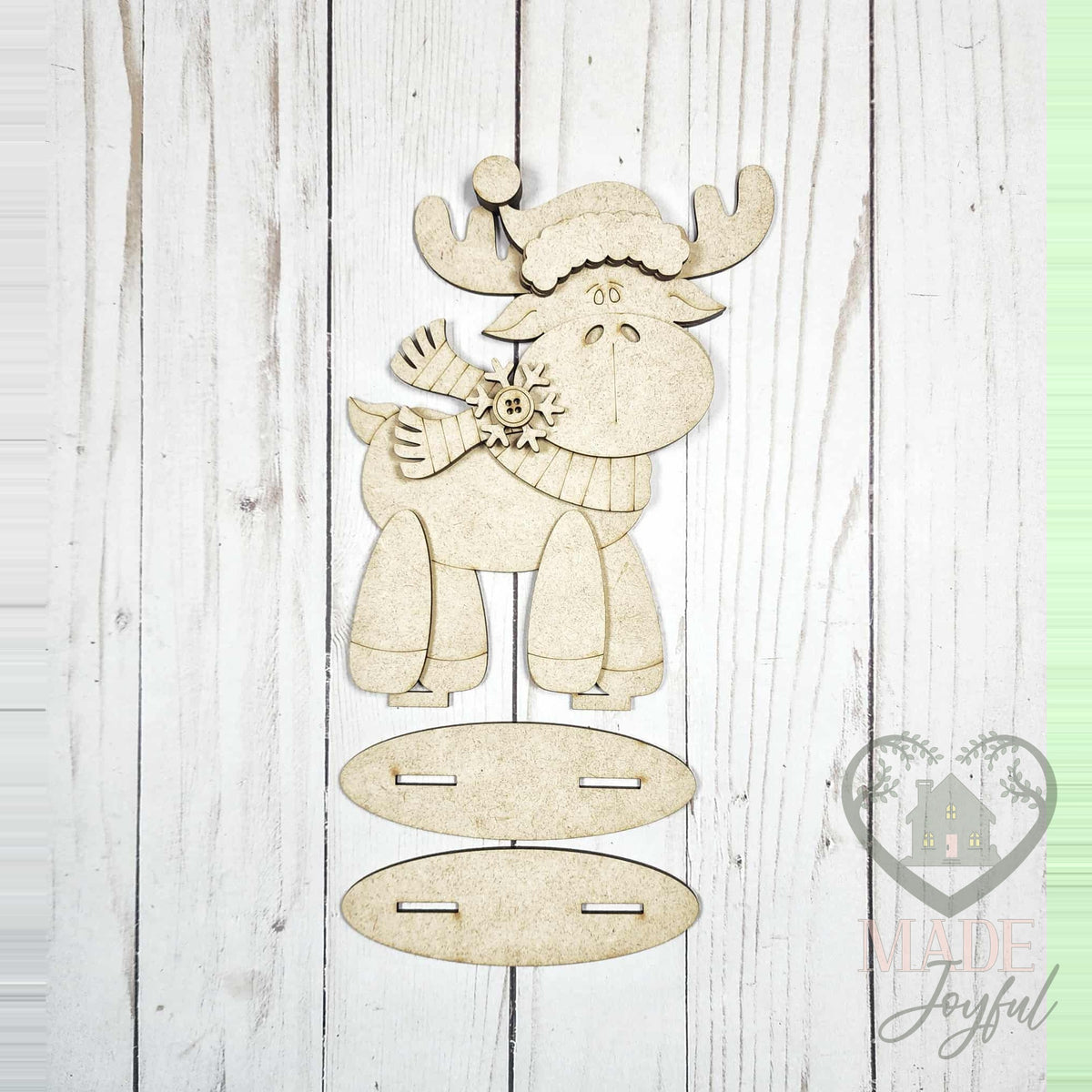 Unfinished laser-cut wood Christmoose Standing Moose Shelf Sitter DIY kit (moose pieces), ready to paint at a DIY party in Williamson County, TN.
