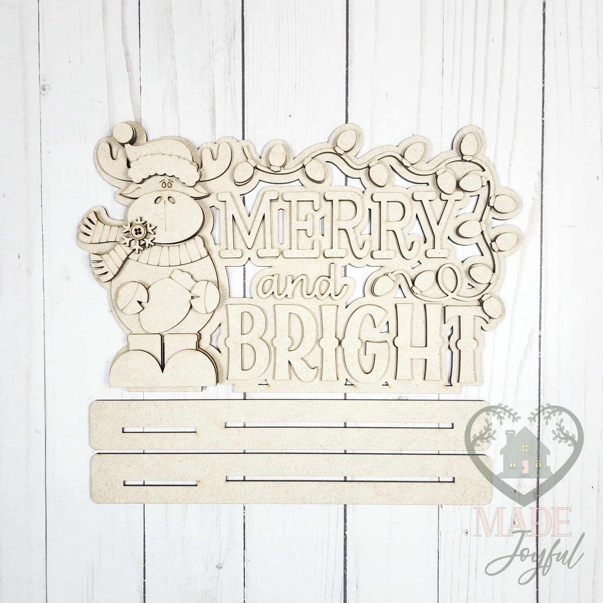 Unfinished laser-cut wood Merry and Bright Christmoose Word Art DIY kit, ready to paint at a DIY party in Williamson County, TN.