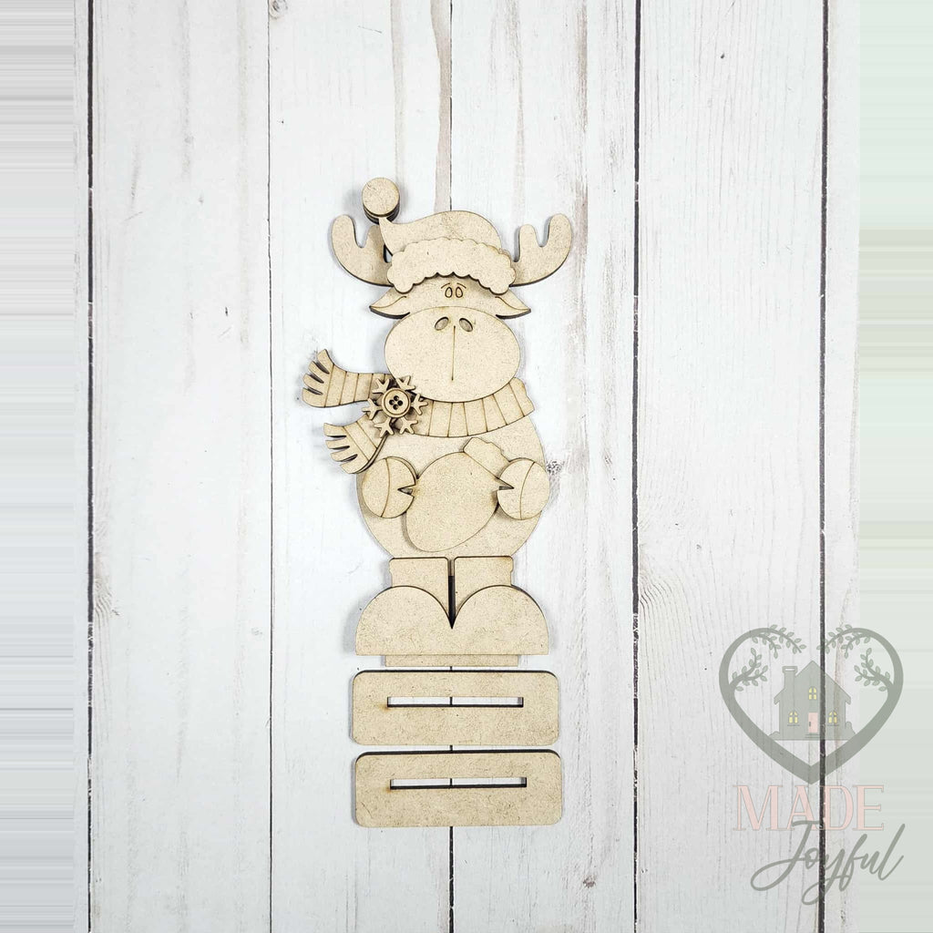 Unfinished laser-cut wood Merry and Bright Christmoose Word Art DIY kit (moose pieces), ready to paint at a DIY party in Williamson County, TN.