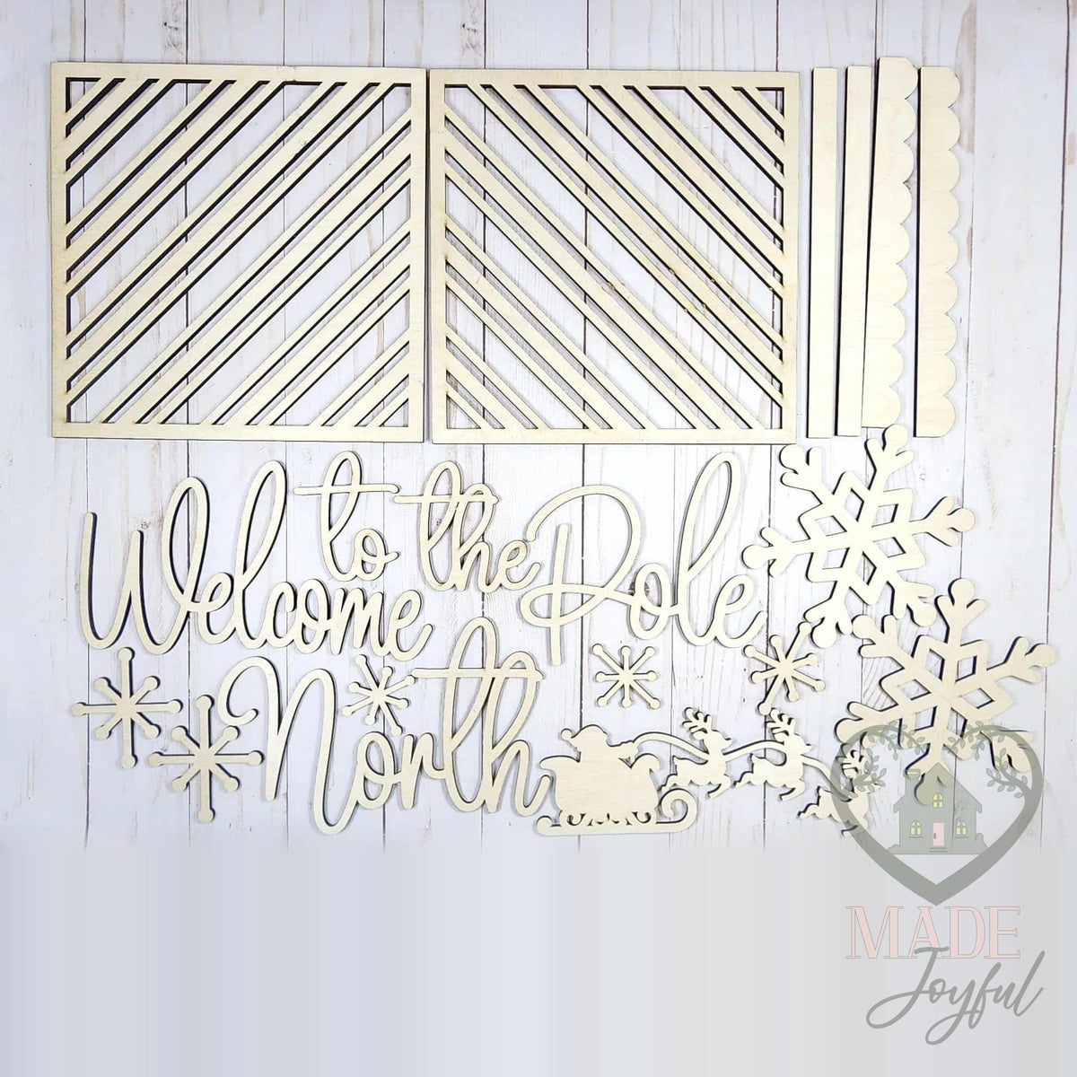 Unfinished laser-cut wood Welcome to the North Pole Porch Leaner DIY kit, ready to paint at a DIY party in Williamson County, TN.