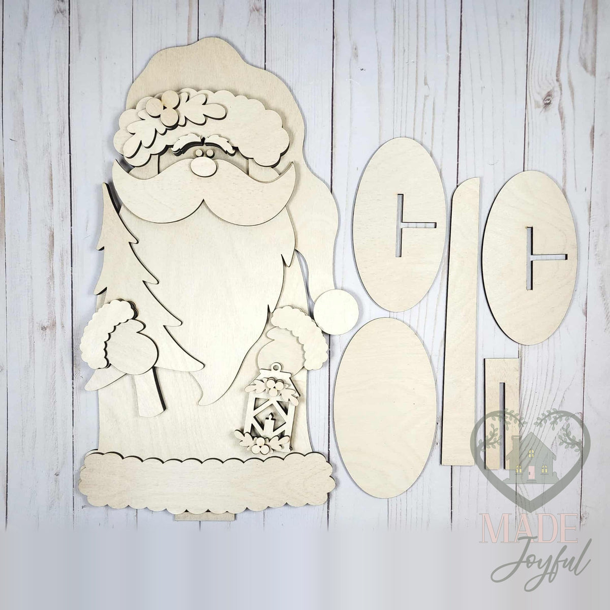 Unfinished laser-cut wood Woodland Santa DIY kit, ready to paint at a DIY party in Williamson County, TN.