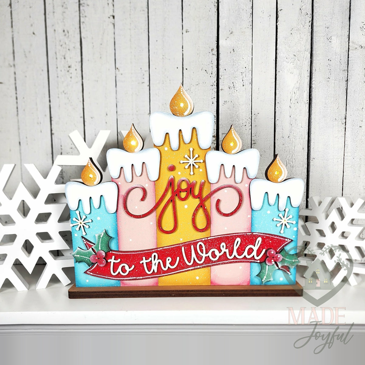 Joy to the World light up candle shelf sitter in pink, yellow, and blue, hand-painted in Brentwood, TN.