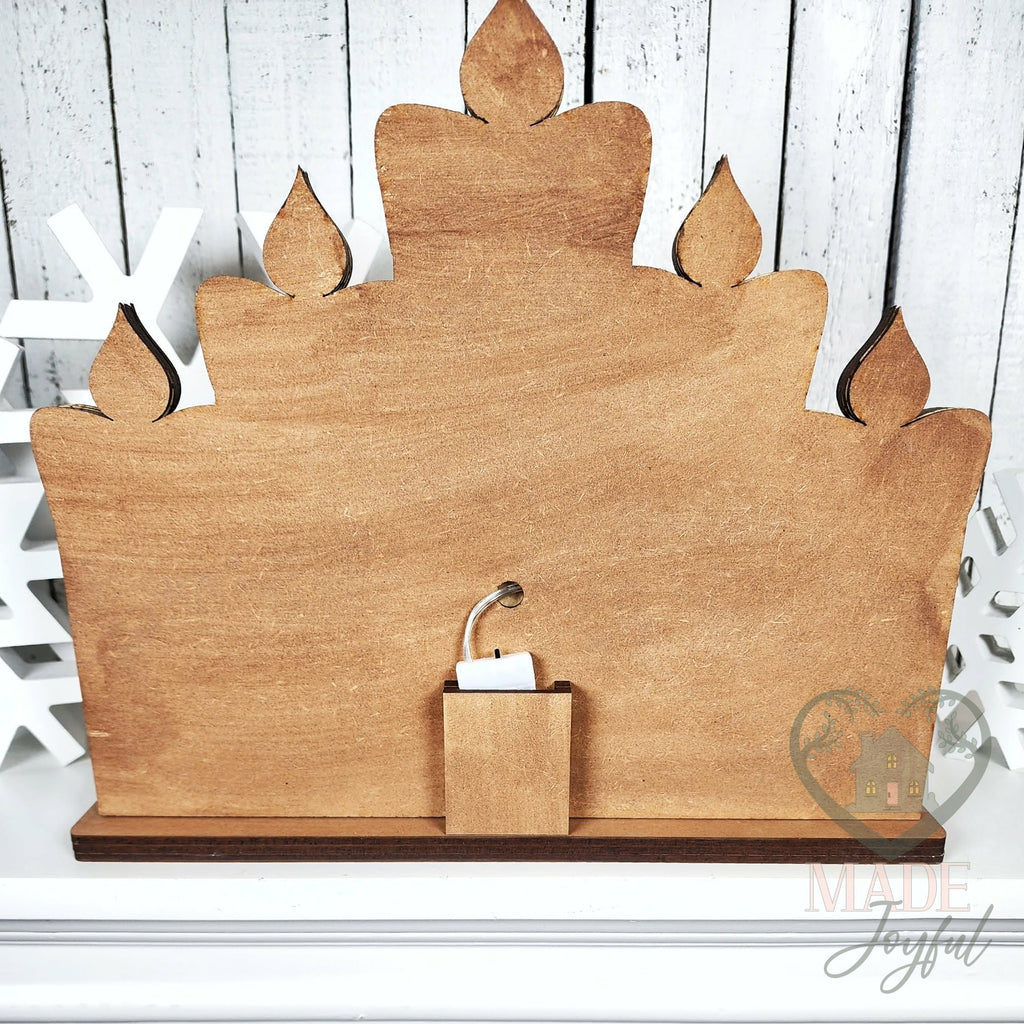 Back of the Joy to the World shelf sitter with battery light pack, hand-painted in Brentwood, TN.