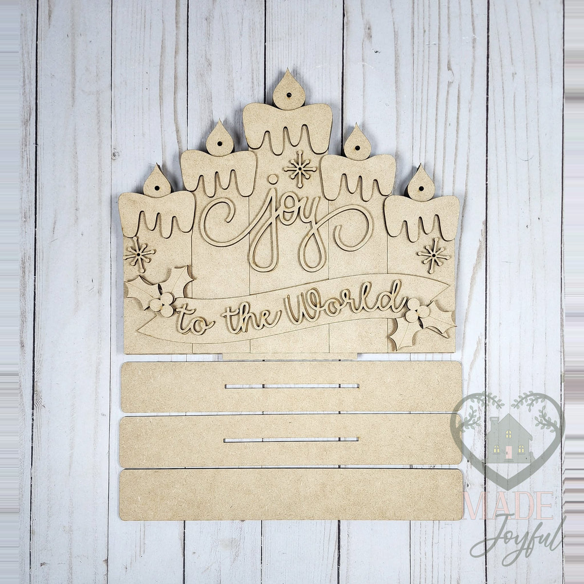 Unfinished laser-cut wood Joy to the World Light Up Candle Shelf Sitter DIY kit, ready to paint at a DIY party in Williamson County, TN.